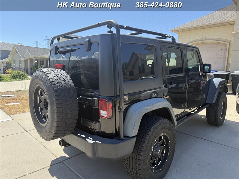 2014 Jeep Wrangler Unlimited Sport - Photo 1 - West Bountiful, UT 84087-1313