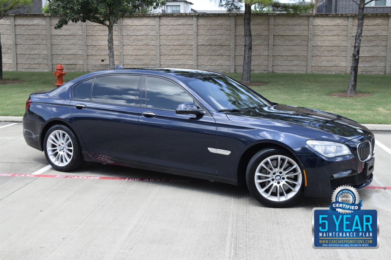 2015 BMW 750Li PREM/SPTS PKG NAV BK/CAM HWY MILES NEW TRADE   - Photo 1 - Stafford, TX 77477