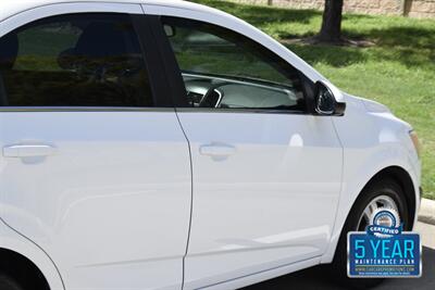 2016 Chevrolet Sonic LT AUTO ALL PWR HWY MILES FRESH TRADE IN CLEAN   - Photo 18 - Stafford, TX 77477