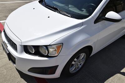 2016 Chevrolet Sonic LT AUTO ALL PWR HWY MILES FRESH TRADE IN CLEAN   - Photo 10 - Stafford, TX 77477