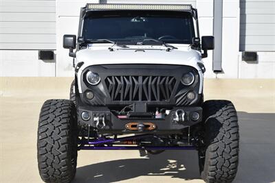 2016 Jeep Wrangler UNLTD RUBICON 4X4 PROFESSIONALY LIFTED HEAD TURNER   - Photo 2 - Stafford, TX 77477