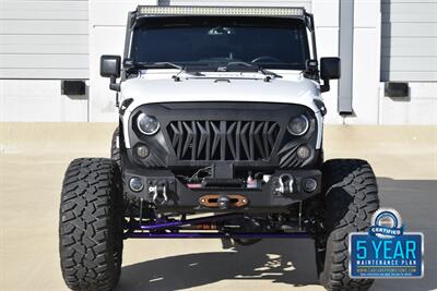 2016 Jeep Wrangler UNLTD RUBICON 4X4 PROFESSIONALY LIFTED HEAD TURNER   - Photo 2 - Stafford, TX 77477