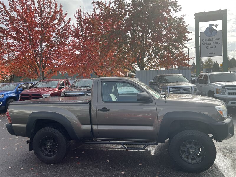 2012 Toyota Tacoma 2.7L I4 159hp 180ft. lbs, 4X4, Running Boards, Bed Liner, Bed Cover, Manual Windows, USB, AUX, Hands Free Phone connectivity. - Photo 5 - Milwaukie, OR 97267
