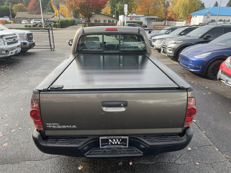 2012 Toyota Tacoma 2.7L I4 159hp 180ft. lbs, 4X4, Running Boards, Bed Liner, Bed Cover, Manual Windows, USB, AUX, Hands Free Phone connectivity. - Photo 9 - Milwaukie, OR 97267