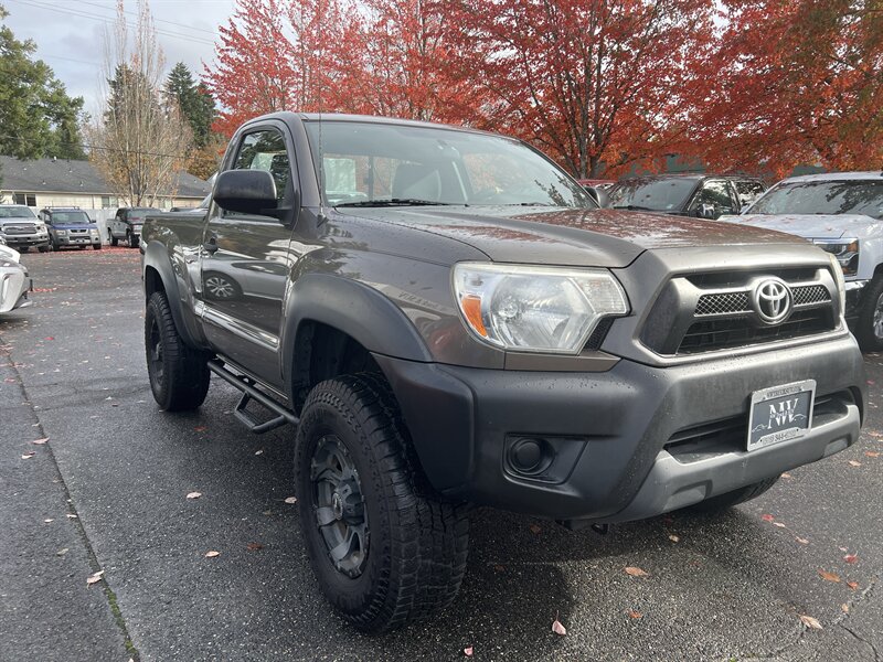 2012 Toyota Tacoma 2.7L I4 159hp 180ft. lbs, 4X4, Running Boards, Bed Liner, Bed Cover, Manual Windows, USB, AUX, Hands Free Phone connectivity. - Photo 4 - Milwaukie, OR 97267