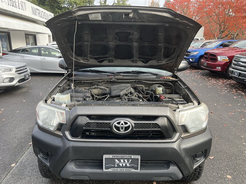 2012 Toyota Tacoma 2.7L I4 159hp 180ft. lbs, 4X4, Running Boards, Bed Liner, Bed Cover, Manual Windows, USB, AUX, Hands Free Phone connectivity. - Photo 11 - Milwaukie, OR 97267