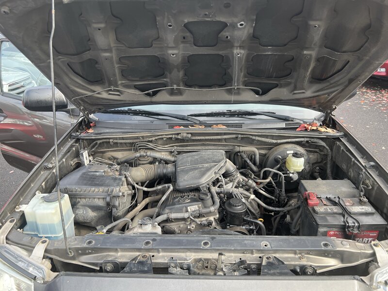 2012 Toyota Tacoma 2.7L I4 159hp 180ft. lbs, 4X4, Running Boards, Bed Liner, Bed Cover, Manual Windows, USB, AUX, Hands Free Phone connectivity. - Photo 12 - Milwaukie, OR 97267