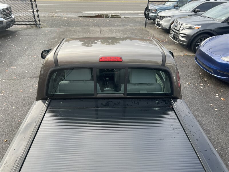 2012 Toyota Tacoma 2.7L I4 159hp 180ft. lbs, 4X4, Running Boards, Bed Liner, Bed Cover, Manual Windows, USB, AUX, Hands Free Phone connectivity. - Photo 27 - Milwaukie, OR 97267