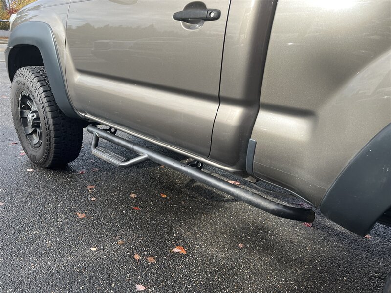 2012 Toyota Tacoma 2.7L I4 159hp 180ft. lbs, 4X4, Running Boards, Bed Liner, Bed Cover, Manual Windows, USB, AUX, Hands Free Phone connectivity. - Photo 14 - Milwaukie, OR 97267