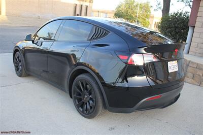 2023 Tesla Model Y Long Range  7-Seats - Photo 4 - Rialto, CA 92376-8618