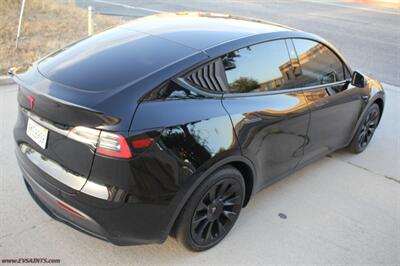 2023 Tesla Model Y Long Range  7-Seats - Photo 6 - Rialto, CA 92376-8618