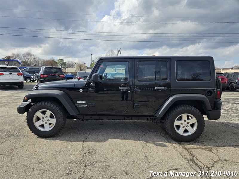 2015 Jeep Wrangler Unlimited Freedom Edition - Photo 2 - Greenwood, IN 46142
