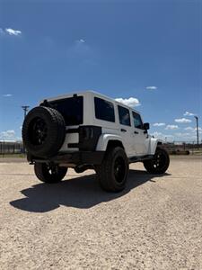 2014 Jeep Wrangler Unlimited Sahara - Photo 4 - Perryton, TX 79070