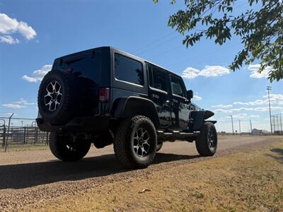 2013 Jeep Wrangler Unlimited Sport   - Photo 4 - Perryton, TX 79070
