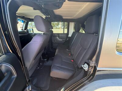 2013 Jeep Wrangler Unlimited Sport   - Photo 7 - Perryton, TX 79070