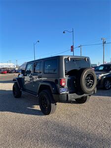 2014 Jeep Wrangler Unlimited Sport   - Photo 3 - Perryton, TX 79070