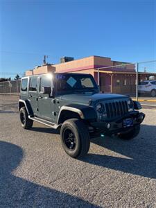 2014 Jeep Wrangler Unlimited Sport   - Photo 2 - Perryton, TX 79070