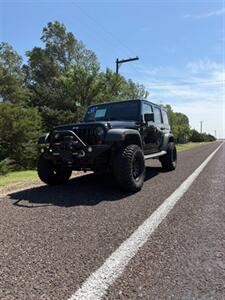 2012 Jeep Wrangler Unlimited Sport   - Photo 1 - Perryton, TX 79070