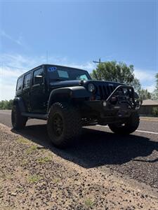 2012 Jeep Wrangler Unlimited Sport   - Photo 4 - Perryton, TX 79070