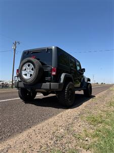 2012 Jeep Wrangler Unlimited Sport   - Photo 3 - Perryton, TX 79070