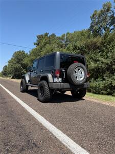 2012 Jeep Wrangler Unlimited Sport   - Photo 2 - Perryton, TX 79070
