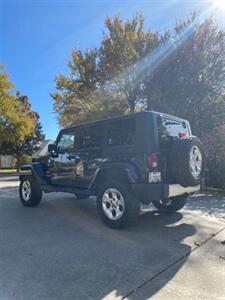 2010 Jeep Wrangler Unlimited Sahara   - Photo 3 - Perryton, TX 79070