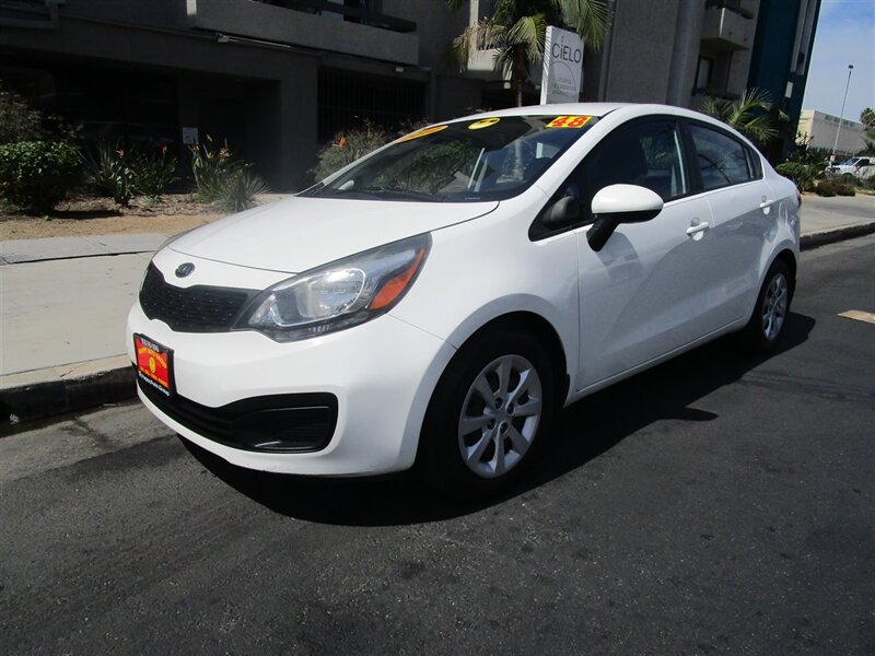 Clear White 2012 Kia Rio LX Sedan Front-Wheel Drive 6-Speed Manual