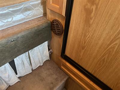 2005 SNOW RIVER TRUCK CAMPER 906 dinette slide  Overhead camper - Photo 13 - Albuquerque, NM 87108