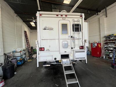 2005 SNOW RIVER TRUCK CAMPER 906 dinette slide  Overhead camper - Photo 19 - Albuquerque, NM 87108