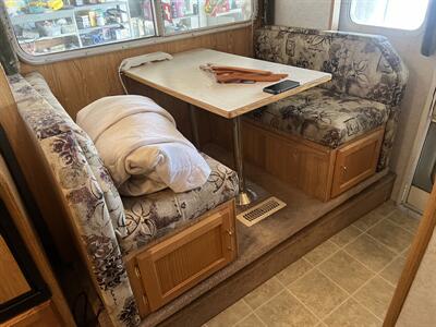 2005 SNOW RIVER TRUCK CAMPER 906 dinette slide  Overhead camper - Photo 10 - Albuquerque, NM 87108