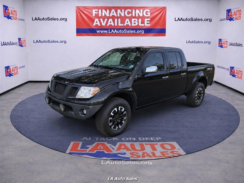 2014 Nissan Frontier 4.0 SL Crew Cab 4X4 AT LWB's photo