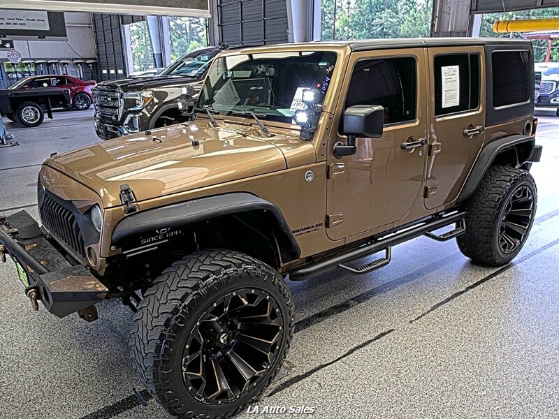 2015 Jeep Wrangler Unlimited Sport - Photo 1 - Monroe, LA 71201