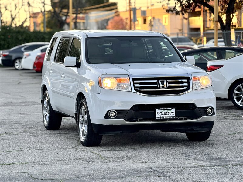 View vehicle photo 3
