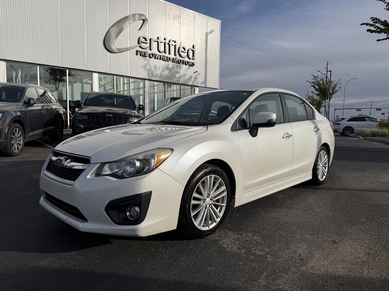 White 2013 Subaru Impreza Sedan All-Wheel Drive 5-Speed Manual