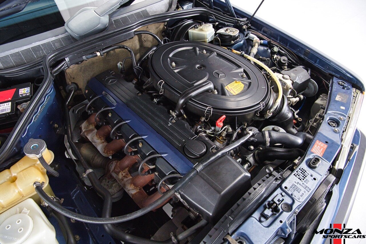 1990 Mercedes-Benz 2.6   - Photo 142 - Houston, TX 77024