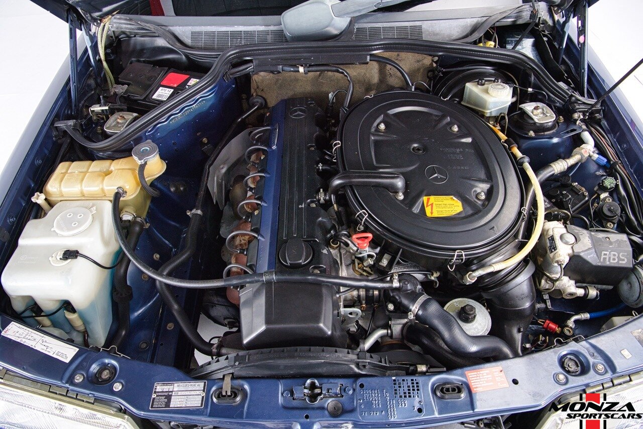 1990 Mercedes-Benz 2.6   - Photo 140 - Houston, TX 77024