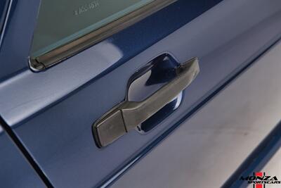 1990 Mercedes-Benz 2.6   - Photo 107 - Houston, TX 77024