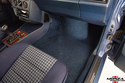 1990 Mercedes-Benz 2.6   - Photo 76 - Houston, TX 77024