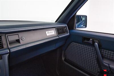 1990 Mercedes-Benz 2.6   - Photo 74 - Houston, TX 77024