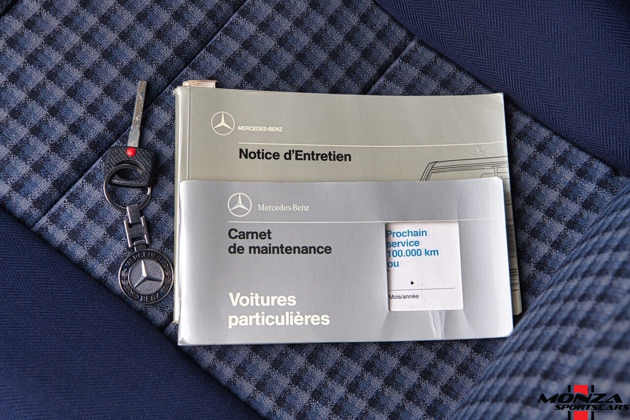 1990 Mercedes-Benz 2.6   - Photo 146 - Houston, TX 77024