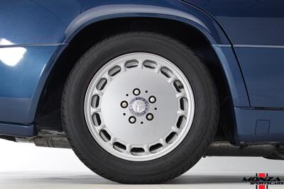 1990 Mercedes-Benz 2.6   - Photo 110 - Houston, TX 77024