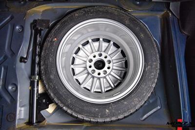 1990 Mercedes-Benz 2.6   - Photo 127 - Houston, TX 77024