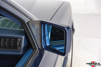 1990 Mercedes-Benz 2.6   - Photo 90 - Houston, TX 77024