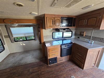 2014 Forest River Windjammer 3065WA   - Photo 11 - Liberty, TX 77575