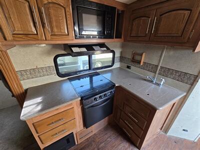 2014 Forest River Windjammer 3065WA   - Photo 9 - Liberty, TX 77575