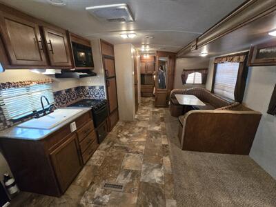 2015 Forest River Surveyor SC294QBLE   - Photo 4 - Liberty, TX 77575