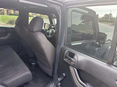 2017 Jeep Wrangler Unlimited Sport S   - Photo 11 - Forsyth, GA 31029