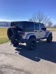 2013 Jeep Wrangler Unlimited Sahara   - Photo 4 - Nampa, ID 83687