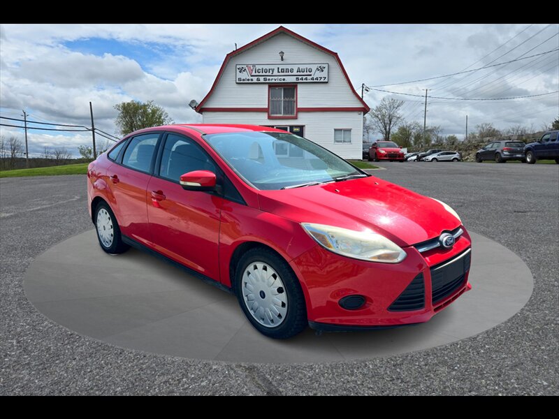 Red 2013 Ford Focus Sedan Front-Wheel Drive 5-Speed Manual