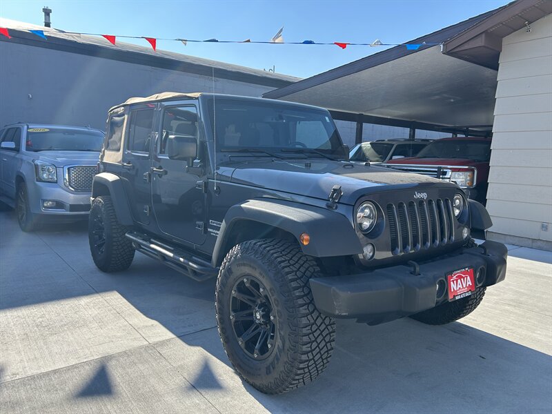 2016 Jeep Wrangler Unlimited Sport - Photo 1 - Lexington, NE 68850